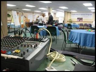 Meeting room set up with Microphones and speakers 
audio visual rentals